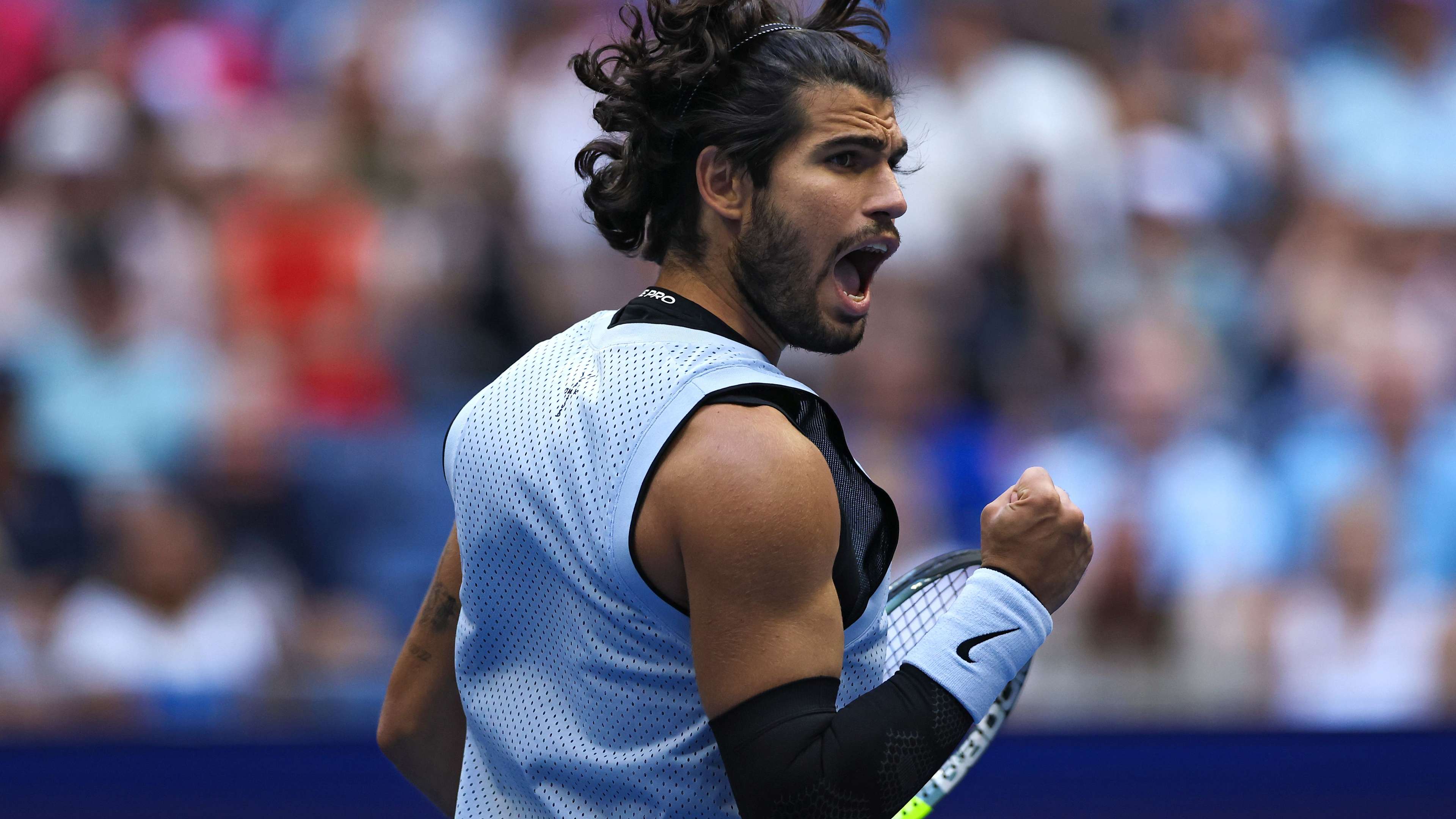 Alcaraz Defeats Paul to Reach US Open Quarter-Finals