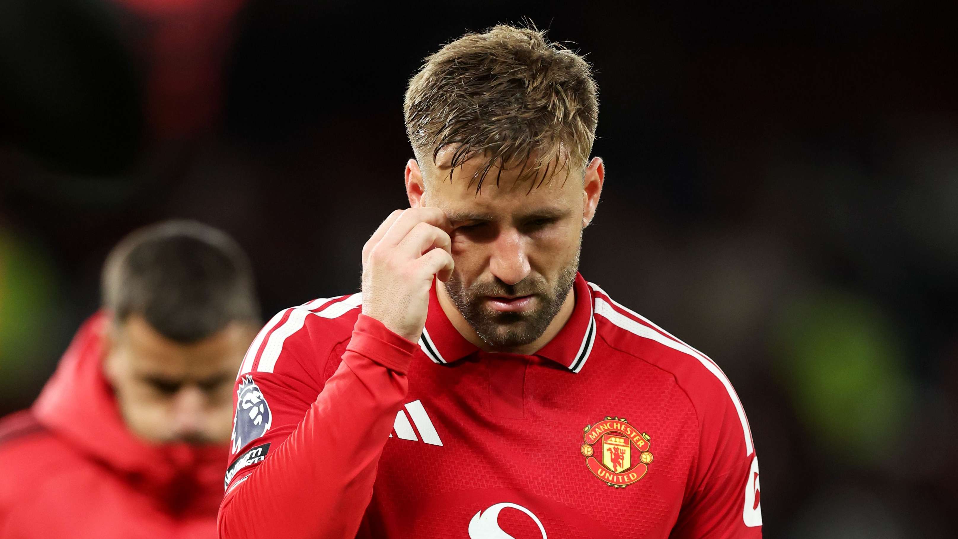Luke Shaw limps out of Old Trafford after fiery Tottenham draw