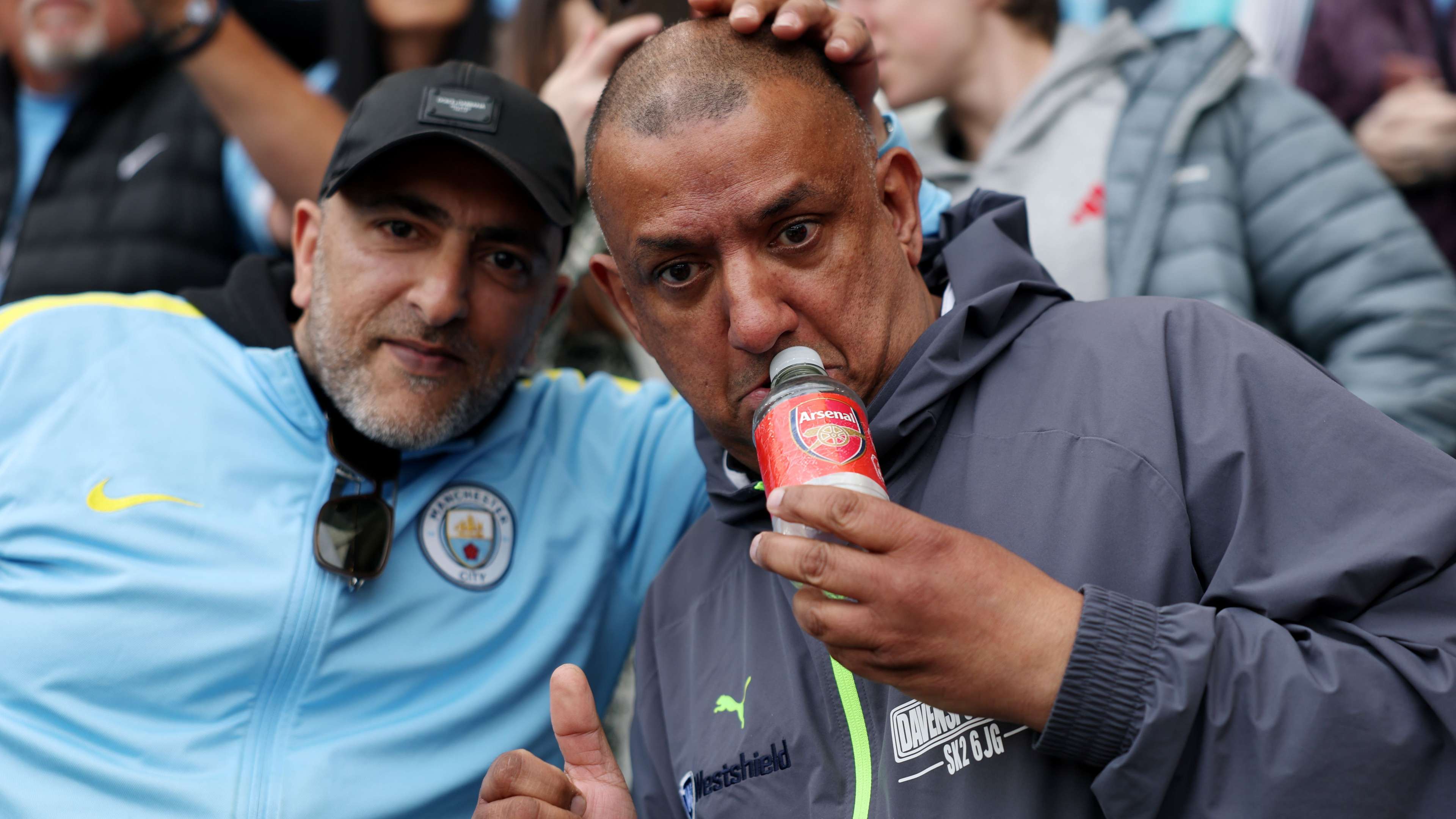 Man City Fan Responds to Arsenal Stars Mocking Bottle Gesture