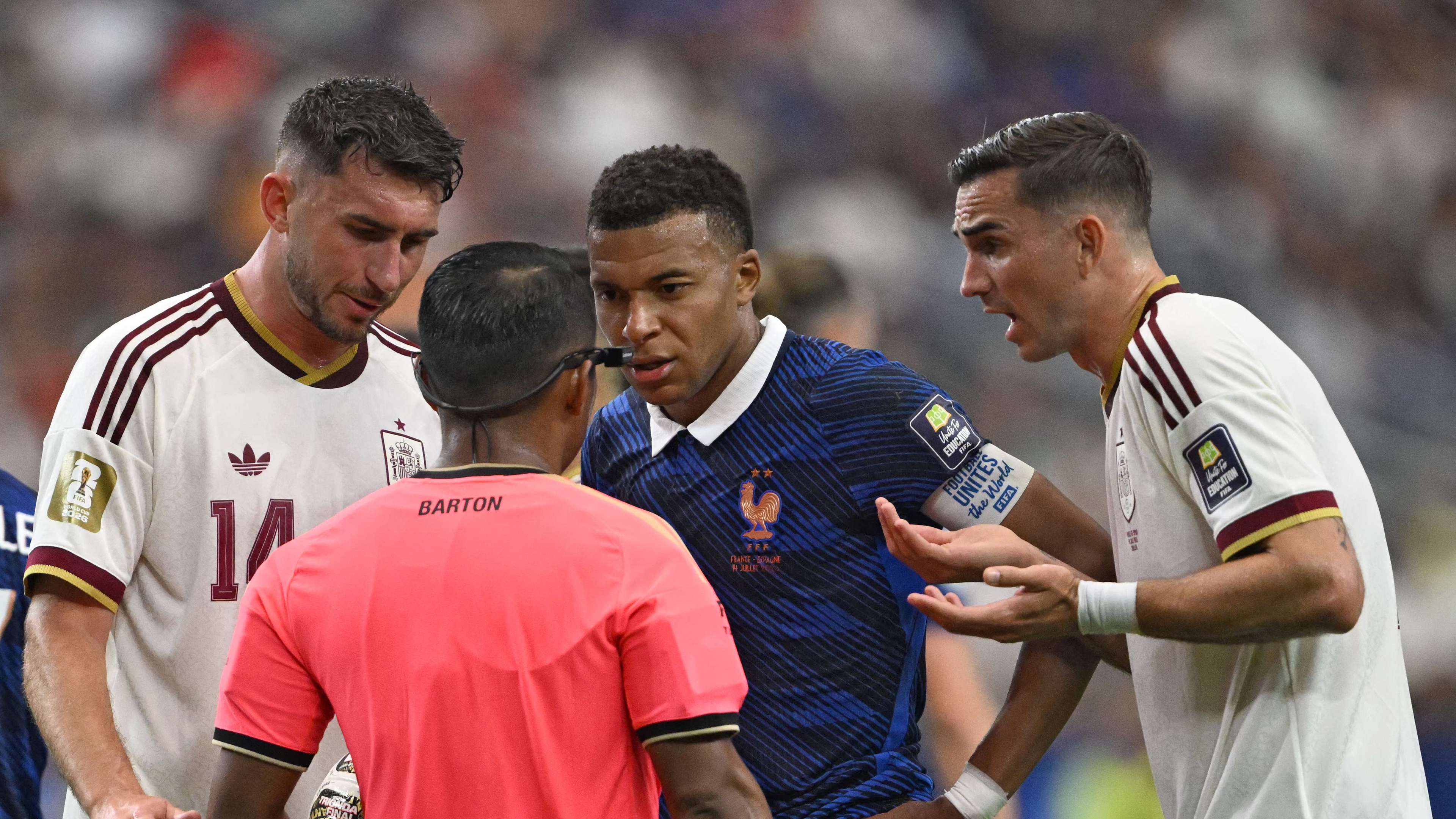 Barton Defends Refereeing After Deschamps Criticism in World